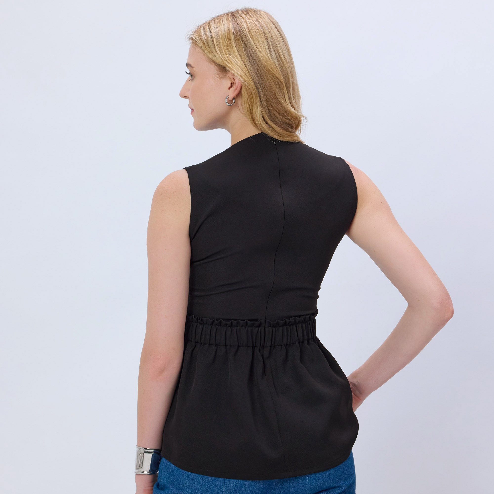 BLACK STUDDED PEPLUM TOP