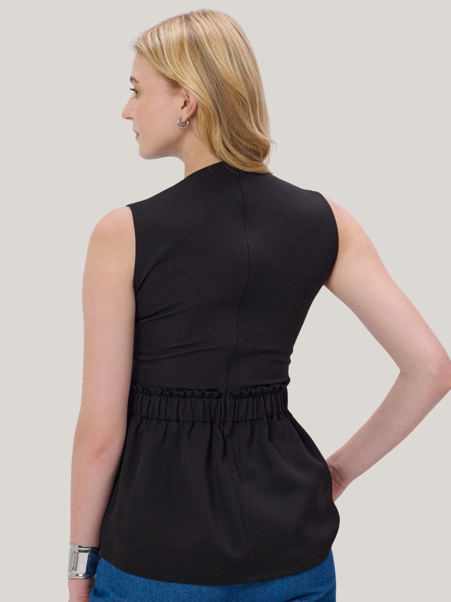 BLACK STUDDED PEPLUM TOP